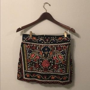 Embellished mini skirt.